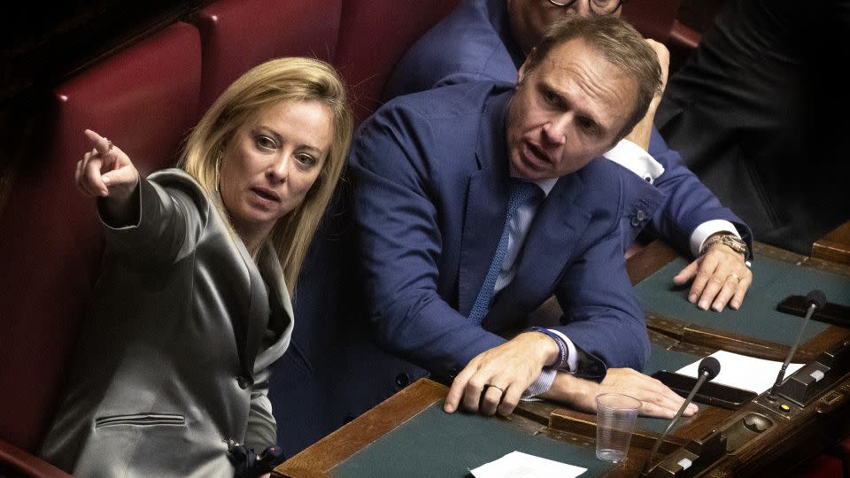 Giorgia Meloni and Francesco Lollobrigida talk during the election of the new President of the Chamber of Deputies, on October 14, 2022 in Rome, Italy.  - Alessandra Benedetti/Corbis/Getty Images