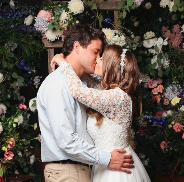 Chandler Powell and Bindi Irwin kiss at their wedding at Australia Zoo