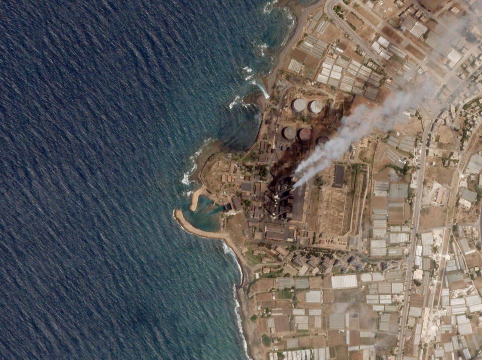 In this satellite photo from Planet Labs Inc., the Baniyas Thermal Station, a major oil refinery is seen in Baniyas, Syria, June 20, 2021. A massive oil spill caused by leakage from the power plant inside the oil refinery is spreading along the coast of the Mediterranean country, Syria's state news agency said and satellite photos showed Wednesday. (Planet Labs Inc. via AP)