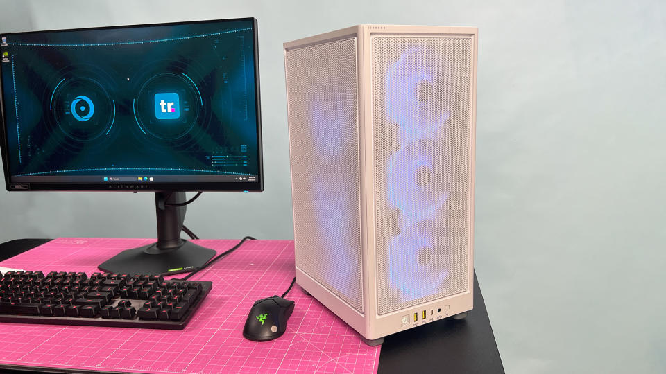 A Origin Chronos V3 gaming PC on a desk