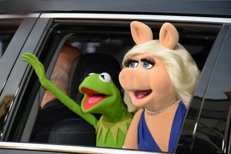 Kermit the Frog and Miss Piggy arrive for the world premiere of Disney's "Muppets Most Wanted" in 2014