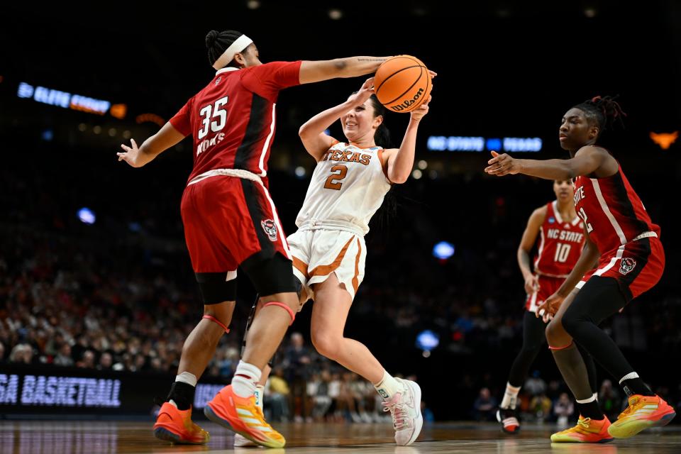 North Carolina State guard Zoe Brooks steals the ball from Texas guard Shaylee Gonzales during the first half of Sunday's 76-66 win over the Longhorns. Top-seeded Texas will return the bulk of its roster next season, including injured point guard Rori Harmon.
