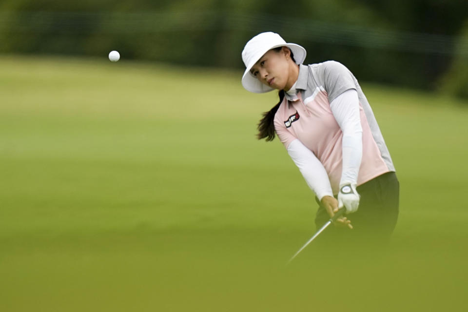 Amy Yang, of South Korea, chips to the green on the ninth hole during the second round of the Chevron Championship women's golf tournament at The Club at Carlton Woods on Friday, April 21, 2023, in The Woodlands, Texas. (AP Photo/Eric Gay)