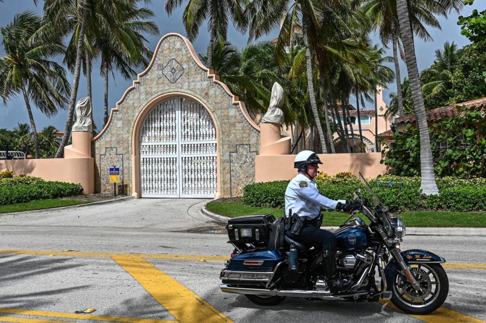 <div class="inline-image__caption"><p>Local law enforcement officers are seen in front of the home of former President Donald Trump at Mar-A-Lago in Palm Beach, Florida, on Aug. 9, 2022.</p></div> <div class="inline-image__credit">Giorgio Viera/AFP via Getty</div>