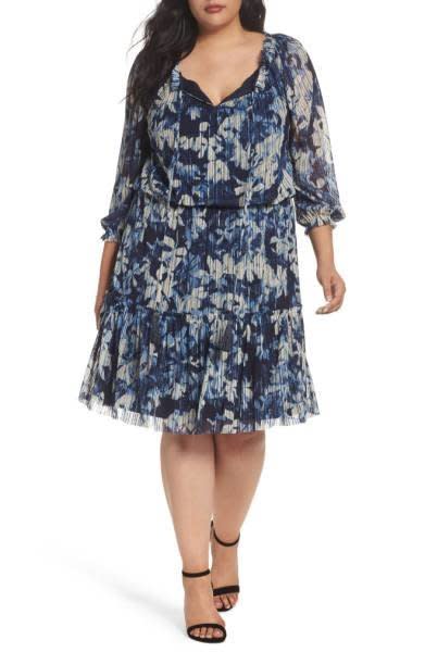 Shop it <a href="http://shop.nordstrom.com/s/london-times-floral-crinkle-mesh-blouson-dress-plus-size/4643627?origin=keywordsearch-personalizedsort&amp;fashioncolor=BLUE" target="_blank"><strong>here</strong></a>.