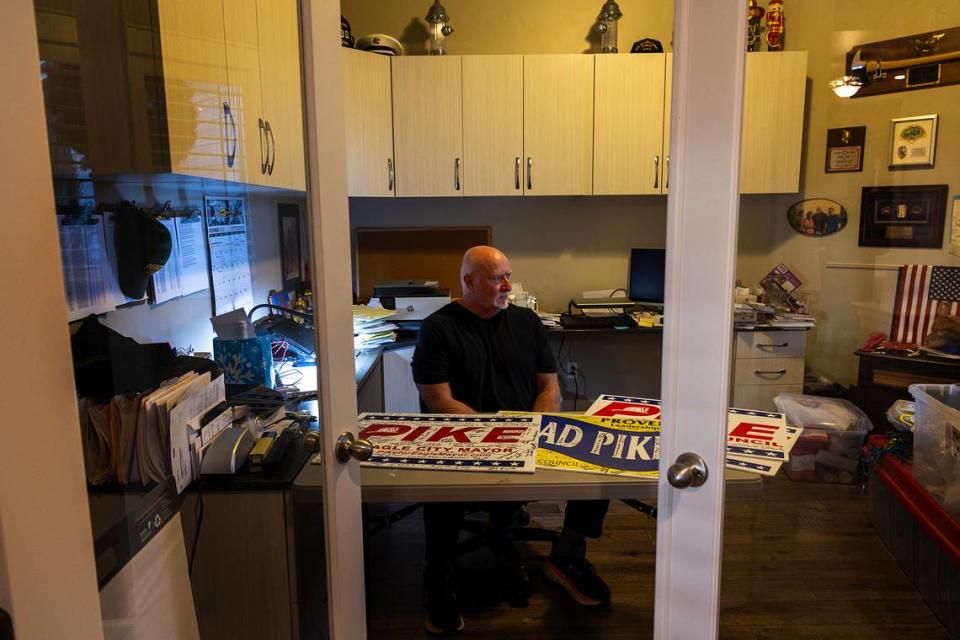 Brad Pike spends time in his home office the day after being elected mayor on Dec. 6.