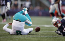 <p>New England Patriots linebacker Elandon Roberts (52) sacks Miami Dolphins quarterback Matt Moore during the second half of an NFL football game, Sunday, Nov. 26, 2017, in Foxborough, Mass. (AP Photo/Michael Dwyer) </p>