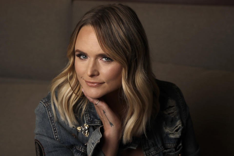 This Oct. 9, 2019 photo shows country singer Miranda Lambert posing in Nashville, Tenn., to promote her latest album "Wildcard," available on Friday, Nov. 1. (AP Photo/Mark Humphrey)