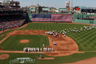 BOSTON, MA - APRIL 20: Current and former Red Sox players, coaches and managers stand on the field before the game between the New York Yankees and the Boston Red Sox on April 20, 2012 at Fenway Park in Boston, Massachusetts. Today marks the 100 year anniversary of the ball park's opening. (Photo by Elsa/Getty Images)