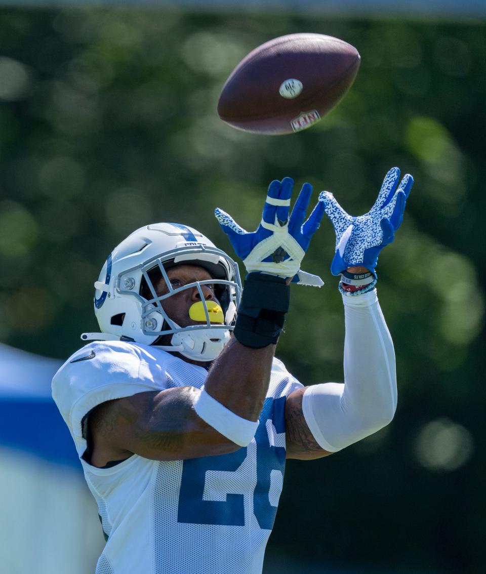 Indianapolis Colts safety Rodney McLeod (26) catches a pass during training camp Wednesday, Aug. 17, 2022, at Grand Park in Westfield, Ind.