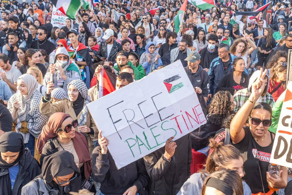 Thousands of people gathered at Porte d'Aix, despite intensive police measures, and marched towards the Saint-Charles railway station in support of Palestinians on Oct. 22 in Marseille, France. (Photo by Sener Yilmaz Aslan/Getty Images)