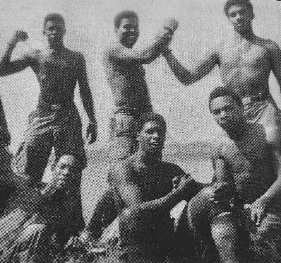 Wayne Smith of Providence, center front, volunteered as a combat medic, serving for a year in the Mekong Delta. He extended his tour because wounded comrades always said to him, "'Doc, please stay with me.' No one wanted to die alone in Vietnam.” After his return, Smith dedicated his life to helping Vietnam veterans.