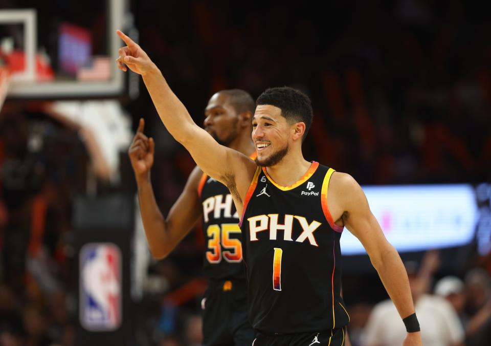 Phoenix Suns guard Devin Booker celebrates during the second half against the Los Angeles Clippers.
