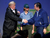 <p>President Donald Trump shakes hands with Senator Ted Cruz (R-TX) as first lady Melania Trump looks on at a church relief center during a visit with flood survivors and volunteers of Hurricane Harvey in Houston, Texas, Sept. 2, 2017. (Photo: Kevin Lamarque/Reuters) </p>