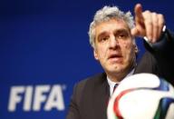 Walter De Gregorio, FIFA Director of Communications and Public Affairs gestures during a news conference at FIFA headquarters in Zurich, Switzerland, May 27, 2015. REUTERS/Ruben Sprich