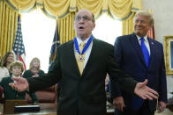 Olympic gold medalist and former University of Iowa wrestling coach Dan Gable speaks after President Donald Trump awarded him the Presidential Medal of Freedom, the highest civilian honor, in the Oval Office of the White House, Monday, Dec. 7, 2020, in Washington. (AP Photo/Patrick Semansky)