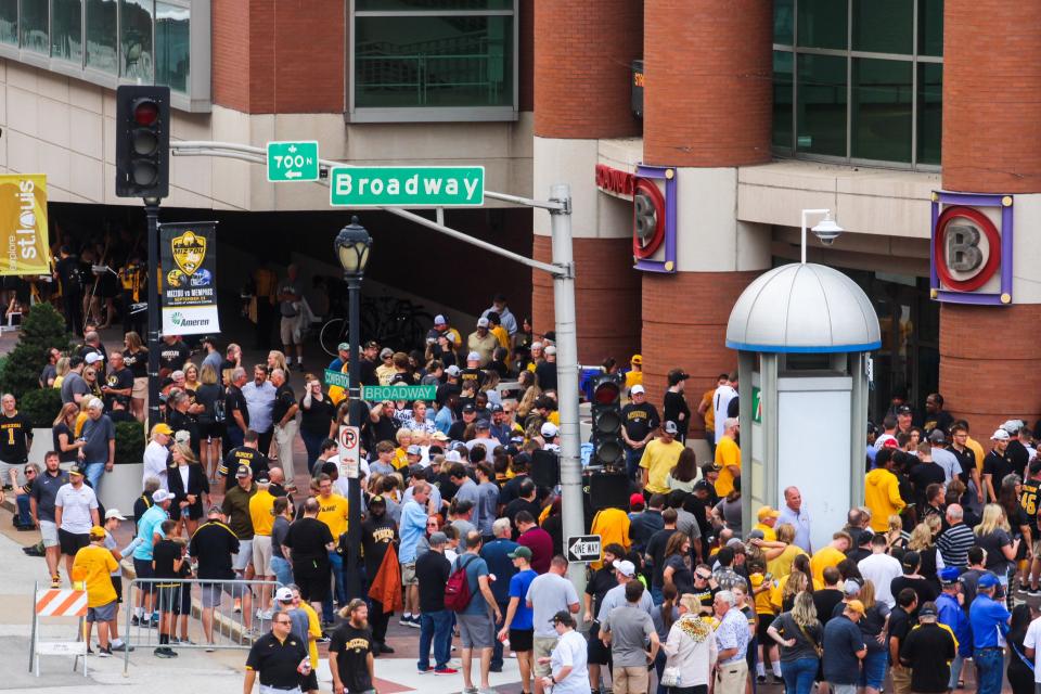Missouri Tigers and Memphis Tigers fans gather at the doors to the Dome at America's Center before Missouri football plays Memphis on Sept. 23, 2023, in St. Louis, Mo.
