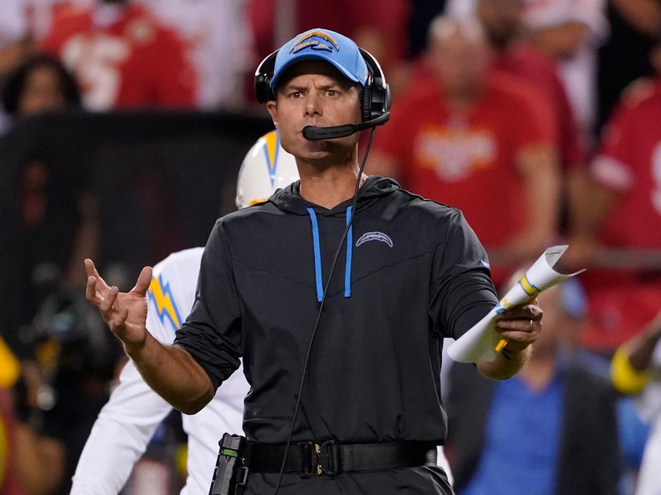 Brandon Staley stands on the sidelines during a game against the Kansas City Chiefs.