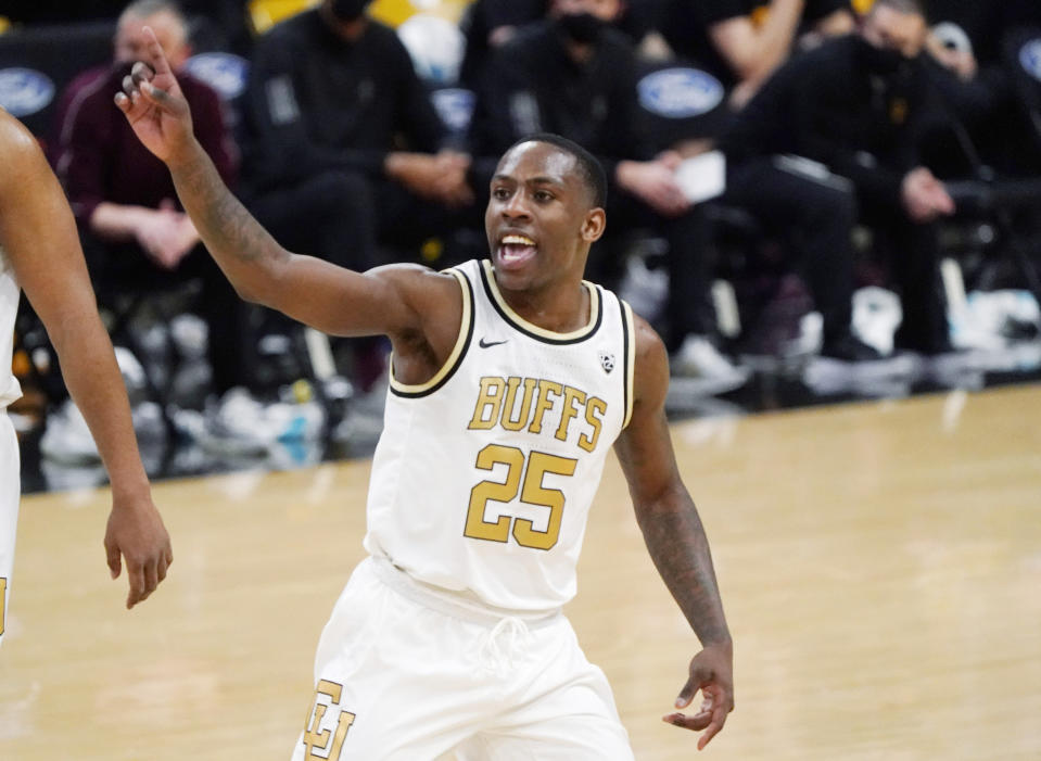 FILE - In this March 4, 2021, file photo, Colorado guard McKinley Wright IV gestures as time runs out in the second half of an NCAA college basketball game against Arizona State in Boulder, Colo. (AP Photo/David Zalubowski, File)