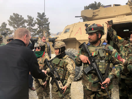 Acting U.S. defense secretary Patrick Shanahan meets with Afghan commandos at Camp Morehead in Kabul, Afghanistan February 11, 2019. REUTERS/Idrees Ali