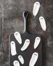 <p>Tiny chocolate chips turn smears of melted white chocolate into ghosts.</p><p><em><strong>Get the recipe at</strong></em> <em><strong><a href="https://www.goodhousekeeping.com/food-recipes/party-ideas/a28591376/white-chocolate-ghosts-recipe/" rel="nofollow noopener" target="_blank" data-ylk="slk:Good Housekeeping;elm:context_link;itc:0;sec:content-canvas" class="link ">Good Housekeeping</a>.</strong></em></p>