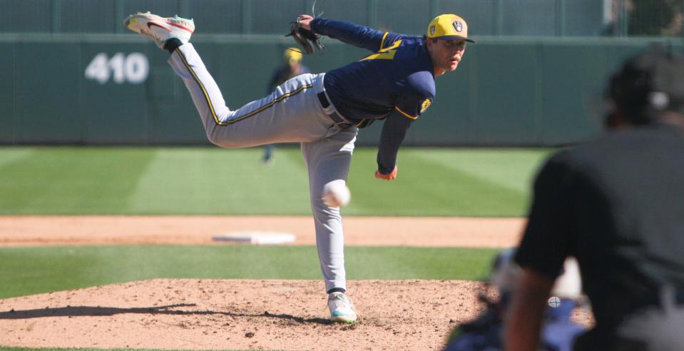 Milwaukee Brewers pitching prospect Tyler Woessner throws a pitch during a spring training game.