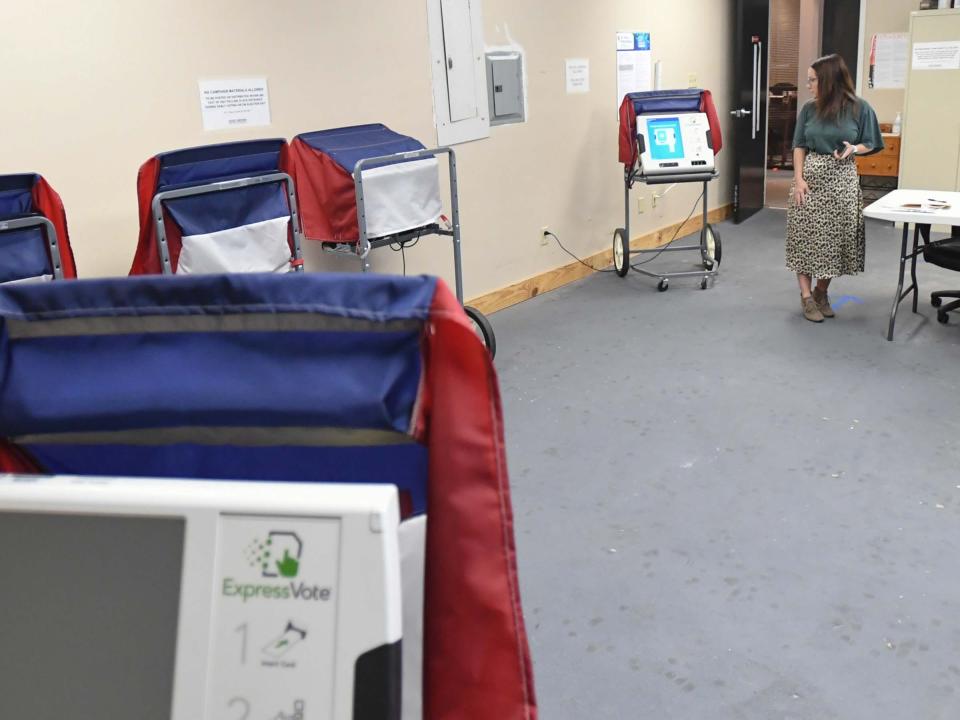 Laura Booth, Executive Director, looks at voting stations at the Voter Registration and Elections of Anderson County during elections in Anderson County, S.C. Tuesday, November 7, 2023.