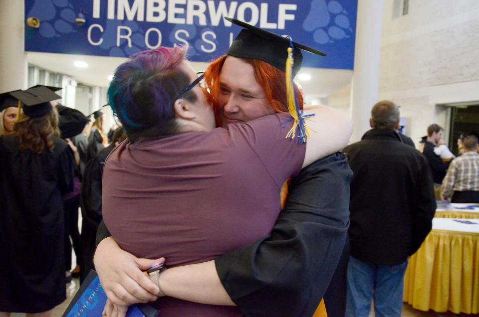 Jennifer (right) and Natasha Ball celebrate together on May 5, 2023 following the North Central Michigan College commencement ceremony.