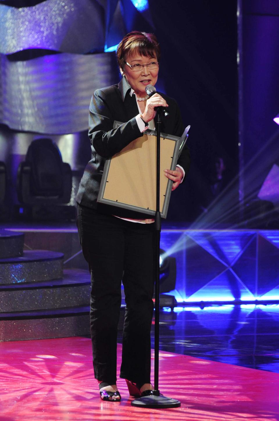 Tina Monzon-Palma receives her "Excellence in Broadcasting Award" during the 26th Star Awards for TV held at the Henry Lee Irwin Theater in Ateneo De Manila University on 18 November 2012. (Angela Galia/NPPA images)