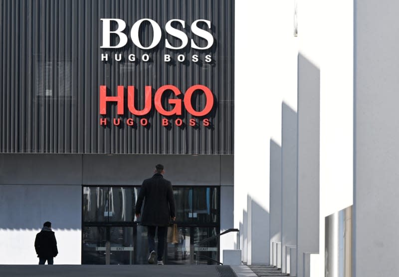 The logo of the Hugo Boss fashion group, taken at an outlet store at the company's headquarters in Metzingen. Bernd Weißbrod/dpa