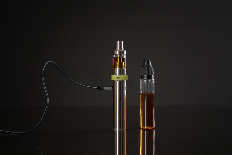 Electronic cigarette on black background