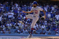 New York Mets relief pitcher Adonis Medina throws to the plate during the 10th inning of a baseball game against the Los Angeles Dodgers Sunday, June 5, 2022, in Los Angeles. (AP Photo/Mark J. Terrill)