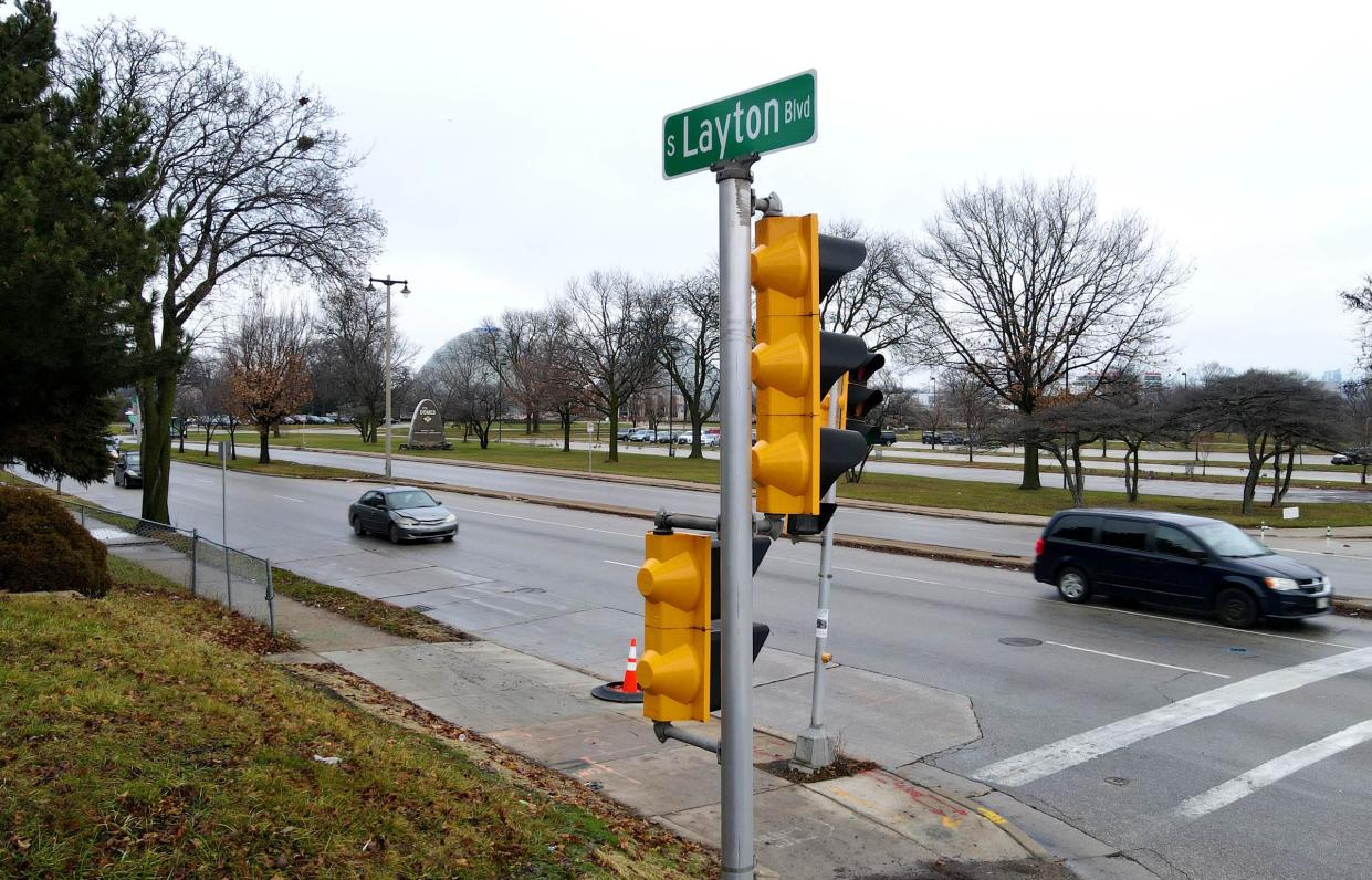 Traffic travels along South Layton Boulevard just south of West Pierce Street, in front of the Mitchell Park Domes. Layton Boulevard is one of two streets in Milwaukee named after meatpacker and philanthropist Frederick Layton - and one of the few in the city that is part of a larger street (in this case, 27th Street).