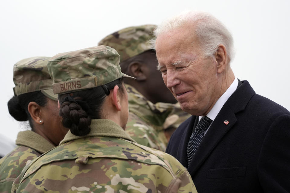 President Joe Biden greets service members after arriving at Dover Air Force Base, Del., Friday, Feb. 2, 2024. (AP Photo/Alex Brandon)