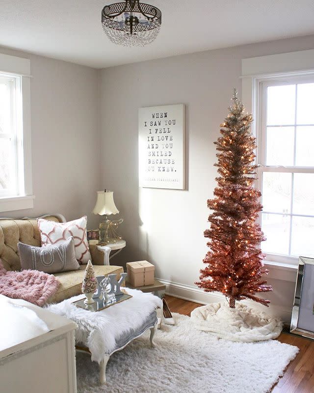 <p>If you want something a bit more, well, subtle, this ombre tree starts as a deep pink on the bottom and gradually gets lighter. When paired with white lights, this tree feels surprisingly traditional.</p><p><a rel="nofollow noopener" href="https://www.homedepot.com/p/Martha-Stewart-Living-7-5-ft-Pre-Lit-Sterling-Tinsel-Pink-and-Champagne-Christmas-Tree-with-750-Clear-Lights-9988900500/302468007?cm_mmc=Shopping|THD|google|&mid=sNsBkIdj1|dc_mtid_8903jx325196_pcrid_122846164168_pkw__pmt__product_302468007_slid_&gclid=EAIaIQobChMIyPqq1rSK2AIVCkwNCh1gOwdoEAQYHCABEgJeP_D_BwE" target="_blank" data-ylk="slk:BUY NOW;elm:context_link;itc:0;sec:content-canvas" class="link ">BUY NOW</a><br></p>