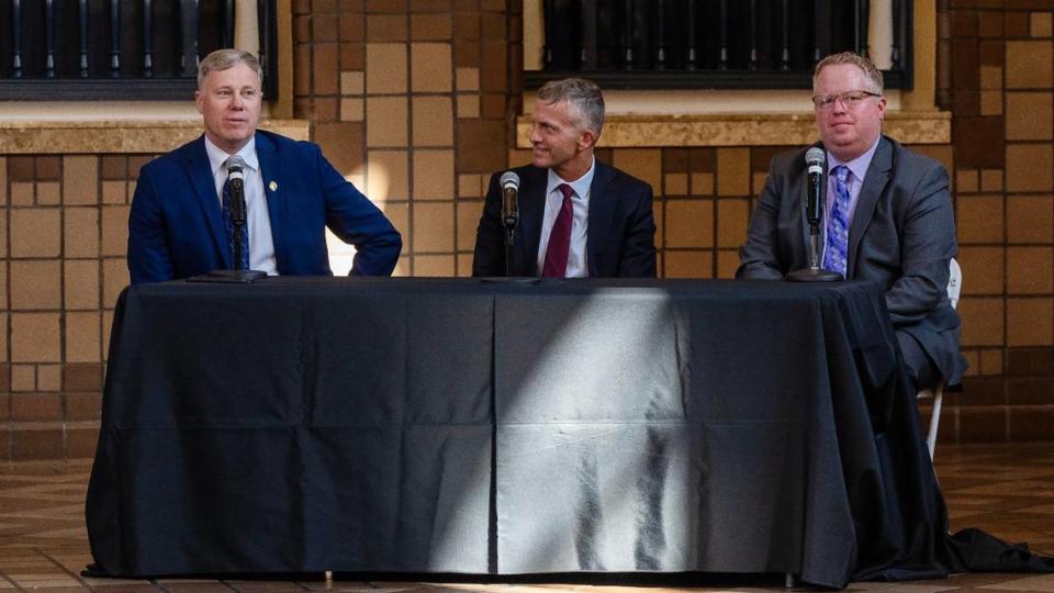 Candidates for Boise Police Chief Tom Worthy, left, Jeffrey Bert, center, and Chris Dennison answer questions during a forum held at the Boise Depot on July 18.