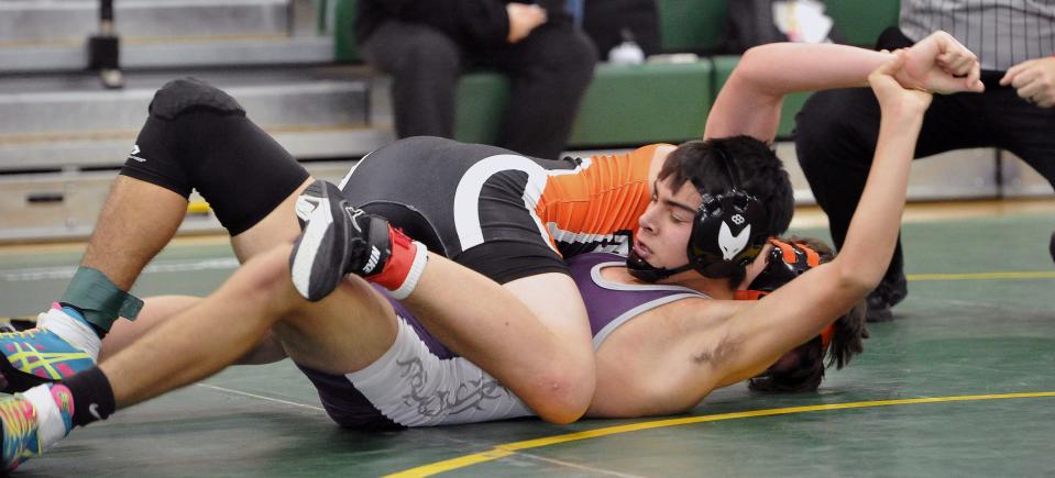 Triway's Ethan Cuarenta is pinned in the final at 120 pounds  by Massillon's Ransom Els.
