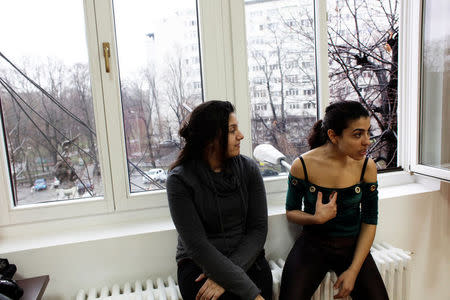 Romanian-Roma actresses Mihaela Dragan (R) and Elena Duminica (L) take part in a rehearsal for their play "Gadjo Dildo" in Bucharest, Romania, February 4, 2016. REUTERS/Andreea Campeanu