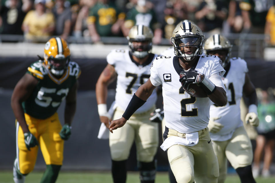 New Orleans Saints quarterback Jameis Winston (2) scrambles for yardage as Green Bay Packers linebacker Jonathan Garvin (53) gives chase during the first half of an NFL football game, Sunday, Sept. 12, 2021, in Jacksonville, Fla. (AP Photo/Stephen B. Morton)