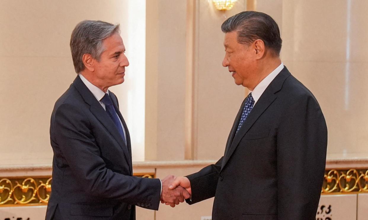 <span>Antony Blinken and Xi Jinping shake hands in the Great Hall of the People in Beijing.</span><span>Photograph: Mark Schiefelbein/Reuters</span>