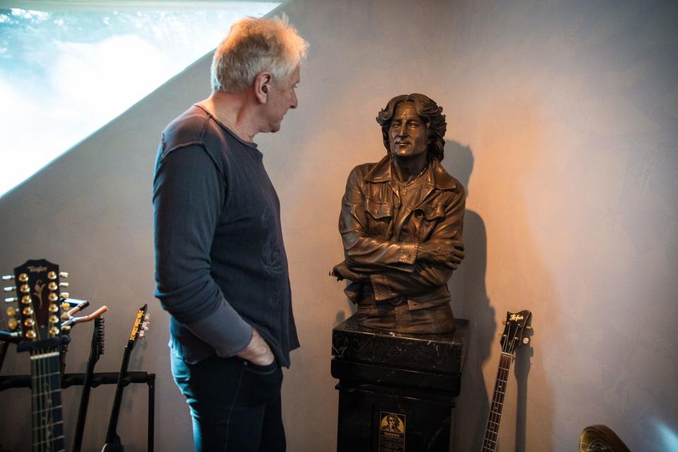Graham Russell of Air Supply looks at the statue of John Lennon at his home in Kamas on Monday, Nov. 5, 2018. He said John Lennon had a huge influence on his career.