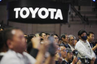 Media members and guests listen as Toyota Motor Corp. CEO Koji Sato speaks during a briefing on the media day at the Japan Mobility Show in Tokyo, Wednesday, Oct. 25, 2023. (AP Photo/Hiro Komae)
