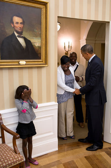 <b>Aug. 8, 2012:</b> "Overcome with emotion, eight-year old Make-A-Wish child Janiya Penny reacts just after meeting the President as he welcomes her family to the Oval Office." (Official White House Photo by Pete Souza)