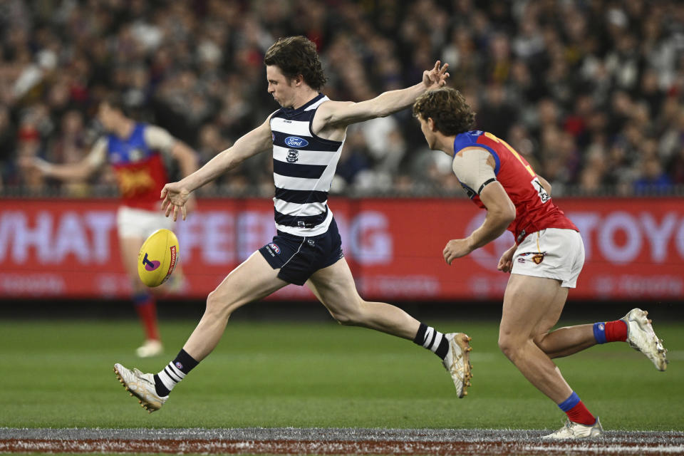 Max Holmes of Geelong during the AFL Preliminary Final match between the Geelong Cats and the Brisbane Lions at the Melbourne Cricket Ground in Melbourne, Friday, Sept. 16, 2022. Early Saturday morning, at a half past midnight, a small but passionate group of fans will gather in front of their TVs in America. They'll be watching the Grand Final, the Super Bowl of Aussie rules football. (AAP Image/Joel Carrett)