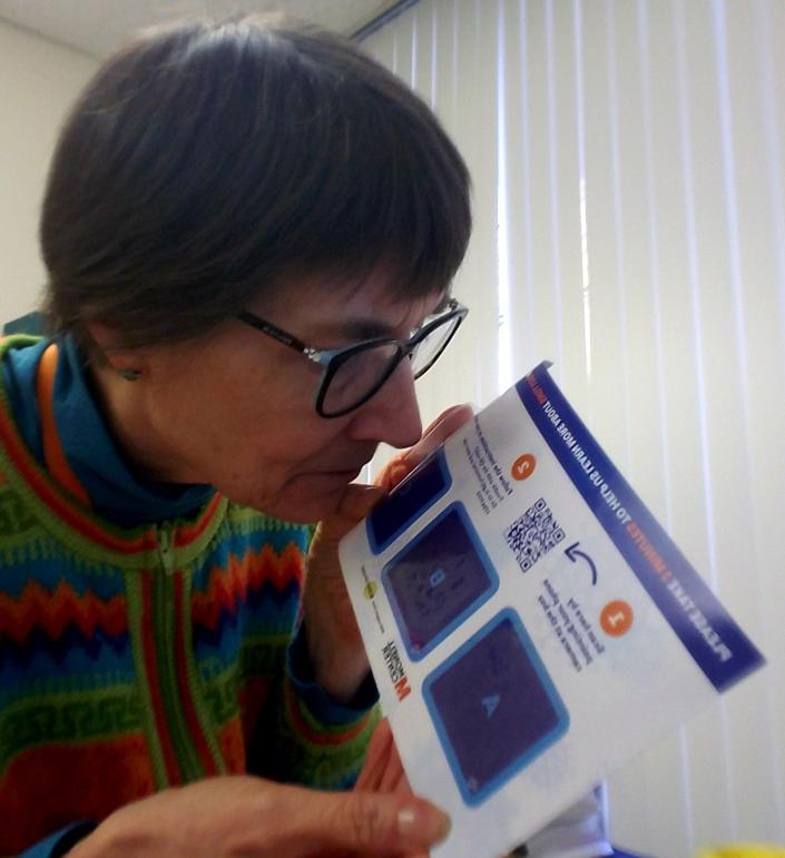 Nancy Rawson, vice president of the Monell Chemical Senses Center in Philadelphia sniffs a card designed to test whether someone has lost their sense of smell.