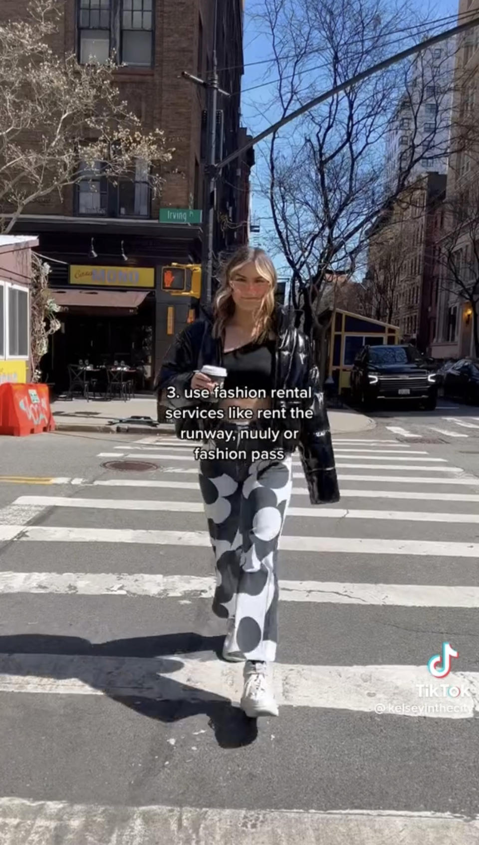 Woman walking at a crosswalk