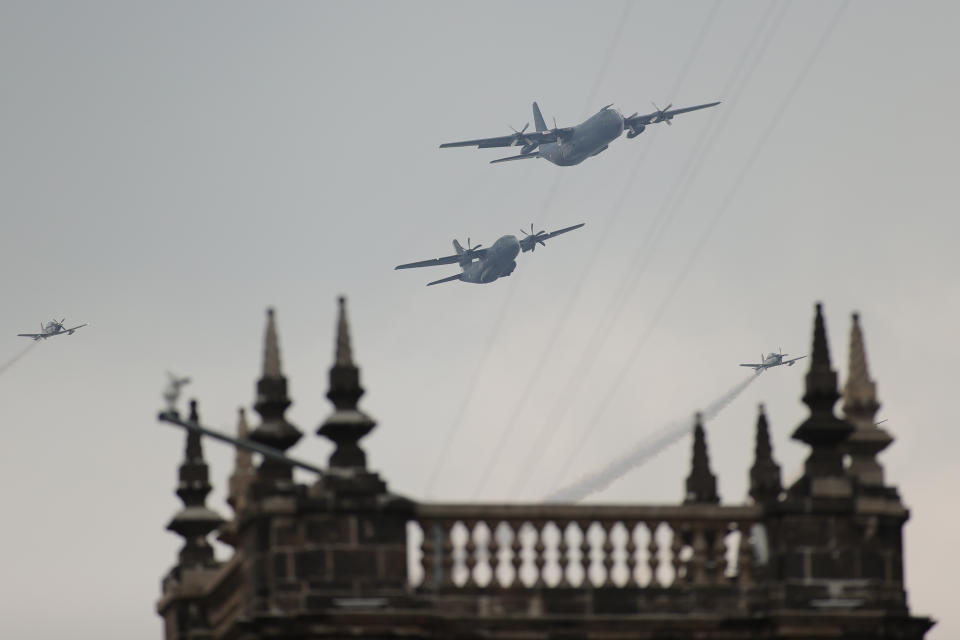 VARIOUS CITIES, MEXICO - SEPTEMBER 16: Mexican Air Force aircrafts perform a ceremonial flight during the Independence Day military parade at Zocalo Square on September 16, 2020 in Various Cities, Mexico. This year El Zocalo remains closed for general public due to coronavirus restrictions. Every September 16 Mexico celebrates the beginning of the revolution uprising of 1810. (Photo by Hector Vivas/Getty Images)