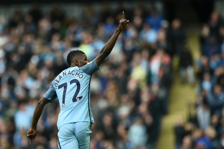 Manchester City striker Kelechi Iheanacho celebrates after scoring their first goal during the English Premier League match against Southampton at the Etihad Stadium in Manchester, north-west England, on October 23, 2016