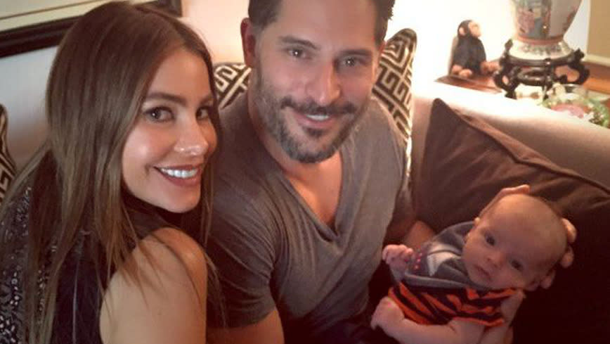 Sofia Vergara and Joe Manganiello holding baby Rafa.