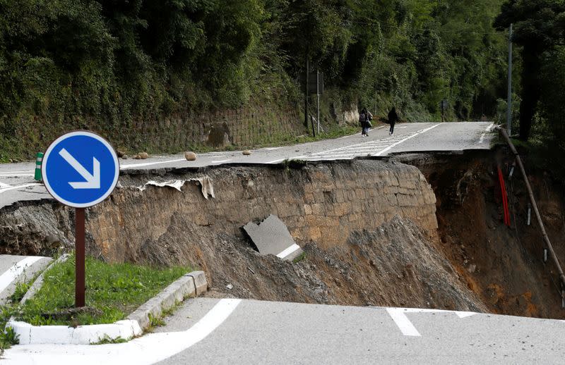 A view shows a road that collapsed into the Vesubie river, after heavy rainfall hit southern France